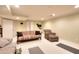 Cozy living room with couches and a chair with an ottoman at 781 Templeton Dr, Loganville, GA 30052
