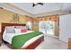 Spacious bedroom with tray ceilings, ample natural light, and neutral decor at 781 Templeton Dr, Loganville, GA 30052