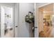 An entryway with closet, bathroom and a view of the kitchen at 215 Cobblestone Trl, Avondale Estates, GA 30002