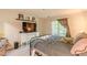 Bedroom with carpet, a large flat-screen TV and access to the balcony with lots of natural light at 215 Cobblestone Trl, Avondale Estates, GA 30002