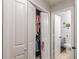 A well-organized closet is next to a bathroom at 215 Cobblestone Trl, Avondale Estates, GA 30002