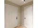 Foyer with white doors, neutral walls, and tile flooring at 215 Cobblestone Trl, Avondale Estates, GA 30002