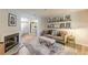 Bright living room featuring a fireplace and an open floor plan at 215 Cobblestone Trl, Avondale Estates, GA 30002