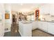Traditional eat-in kitchen with granite countertops, white cabinetry, and stainless steel appliances at 3099 Farmington Se Dr, Atlanta, GA 30339