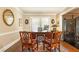 Comfortable office featuring a dark wood desk, seating, and neutral-toned walls complemented by elegant decor at 3099 Farmington Se Dr, Atlanta, GA 30339
