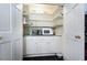 Pantry showing ample shelving space, counter space, and cabinet space at 3099 Farmington Se Dr, Atlanta, GA 30339