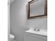 Clean bathroom features sleek vanity, modern fixtures, and neutral tones at 4066 Covered Bridge Sw Rd, Smyrna, GA 30082