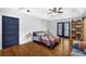 Spacious bedroom with tray ceiling and a view to the backyard at 4066 Covered Bridge Sw Rd, Smyrna, GA 30082