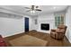 Cozy living room featuring fireplace and hardwood floors at 4066 Covered Bridge Sw Rd, Smyrna, GA 30082