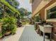 Open deck with barbecue grill, sink, and landscaped yard in the background at 410 Hunters Cove Ct, Lawrenceville, GA 30044