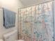 Shower with decorative shower curtain at 410 Hunters Cove Ct, Lawrenceville, GA 30044
