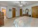 Spacious bedroom featuring multiple closets and neutral carpeting at 410 Hunters Cove Ct, Lawrenceville, GA 30044