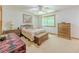 Bright bedroom with carpet flooring, ceiling fan, and warm accents at 410 Hunters Cove Ct, Lawrenceville, GA 30044