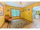 Comfortable dining area with wood-look floors, a large window, and a view into the kitchen at 410 Hunters Cove Ct, Lawrenceville, GA 30044