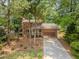 Charming two-story home with a well-manicured front yard, long driveway, and an attached two-car garage at 410 Hunters Cove Ct, Lawrenceville, GA 30044
