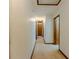 Hallway with neutral walls and carpeting at 410 Hunters Cove Ct, Lawrenceville, GA 30044