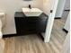 Contemporary bathroom featuring stylish vanity, sink, and modern fixtures at 4756 Manly Ct, Stone Mountain, GA 30088
