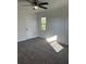 Bright bedroom with a ceiling fan and natural light at 4756 Manly Ct, Stone Mountain, GA 30088