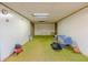 Spacious unfinished basement featuring white walls and green carpet at 2000 Stone Mountain Lithonia Rd, Lithonia, GA 30058