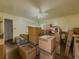 Bedroom interior filled with moving boxes beneath a ceiling fan fixture at 2000 Stone Mountain Lithonia Rd, Lithonia, GA 30058