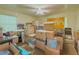 Bedroom interior filled with moving boxes beneath a ceiling fan fixture at 2000 Stone Mountain Lithonia Rd, Lithonia, GA 30058