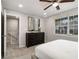 A staged bedroom is complete with a bed, matching furniture, and a window overlooking the neighborhood at 3149 Buford Hwy # 3, Brookhaven, GA 30329