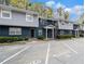 Exterior of building showing parking and brick construction and simple landscaping in front of building at 3149 Buford Hwy # 3, Brookhaven, GA 30329