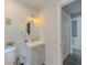 Charming bathroom featuring a modern vanity with storage and stylish round mirror at 377 Wyndham Way, Atlanta, GA 30315