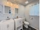 Bathroom featuring double sinks and modern tiling at 377 Wyndham Way, Atlanta, GA 30315