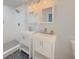 Bathroom featuring double sinks and a glass door shower at 377 Wyndham Way, Atlanta, GA 30315