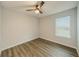 Bright bedroom with a ceiling fan and a large window at 377 Wyndham Way, Atlanta, GA 30315
