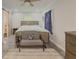 This bedroom features a decorative rug and a gray sofa in the corner at 377 Wyndham Way, Atlanta, GA 30315