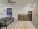 This bedroom features a decorative rug, ceiling fan, and sliding barn door at 377 Wyndham Way, Atlanta, GA 30315