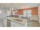 Bright, open-concept kitchen with stainless steel appliances, granite countertops, and modern fixtures at 377 Wyndham Way, Atlanta, GA 30315