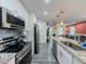 Well-appointed kitchen with modern appliances and stylish finishes at 377 Wyndham Way, Atlanta, GA 30315