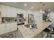Updated kitchen with stainless steel appliances and granite countertops at 377 Wyndham Way, Atlanta, GA 30315
