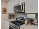 Kitchen with stainless appliances and countertop seating at 377 Wyndham Way, Atlanta, GA 30315