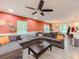 Open-concept living area with modern decor, a comfortable sectional, and seamless flow to the kitchen at 377 Wyndham Way, Atlanta, GA 30315