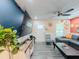 Stylish living room with a large sectional sofa, modern decor, and wood-look floors at 377 Wyndham Way, Atlanta, GA 30315
