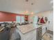 Open kitchen to dining and living area with nice countertops at 377 Wyndham Way, Atlanta, GA 30315