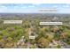 This aerial view shows the property's location near Brown's Mill Golf Course, and South Atlanta High School at 53 Springside Se Dr, Atlanta, GA 30354