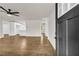 Bright, open-concept living room with hardwood floors and neutral paint at 53 Springside Se Dr, Atlanta, GA 30354