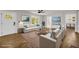Cozy, staged living room with hardwood floors, neutral paint and stylish decor at 53 Springside Se Dr, Atlanta, GA 30354