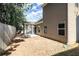 View of the home's backyard with a screened-in porch and wooden fence at 610 Sunflower Dr, Canton, GA 30114
