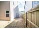 Side yard of the home showing a wooden fence separating two properties at 610 Sunflower Dr, Canton, GA 30114