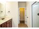 Bathroom with marble counter tops, a spacious glassed shower and a walk in closet at 610 Sunflower Dr, Canton, GA 30114