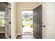 Welcoming entryway with hardwood floors, open doorway and lots of natural light at 610 Sunflower Dr, Canton, GA 30114