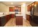 Well-equipped kitchen with granite countertops, island and stainless steel appliances at 610 Sunflower Dr, Canton, GA 30114
