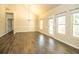 Spacious living room with vaulted ceilings, multiple windows, and hardwood floors at 610 Sunflower Dr, Canton, GA 30114