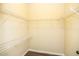 Spacious walk-in closet featuring metal shelving, with ample space for storage at 610 Sunflower Dr, Canton, GA 30114